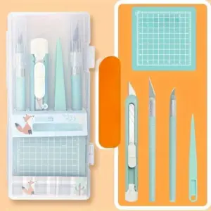 Mintgrünes Bastelmesser-Set mit Schneidematte in transparenter Box